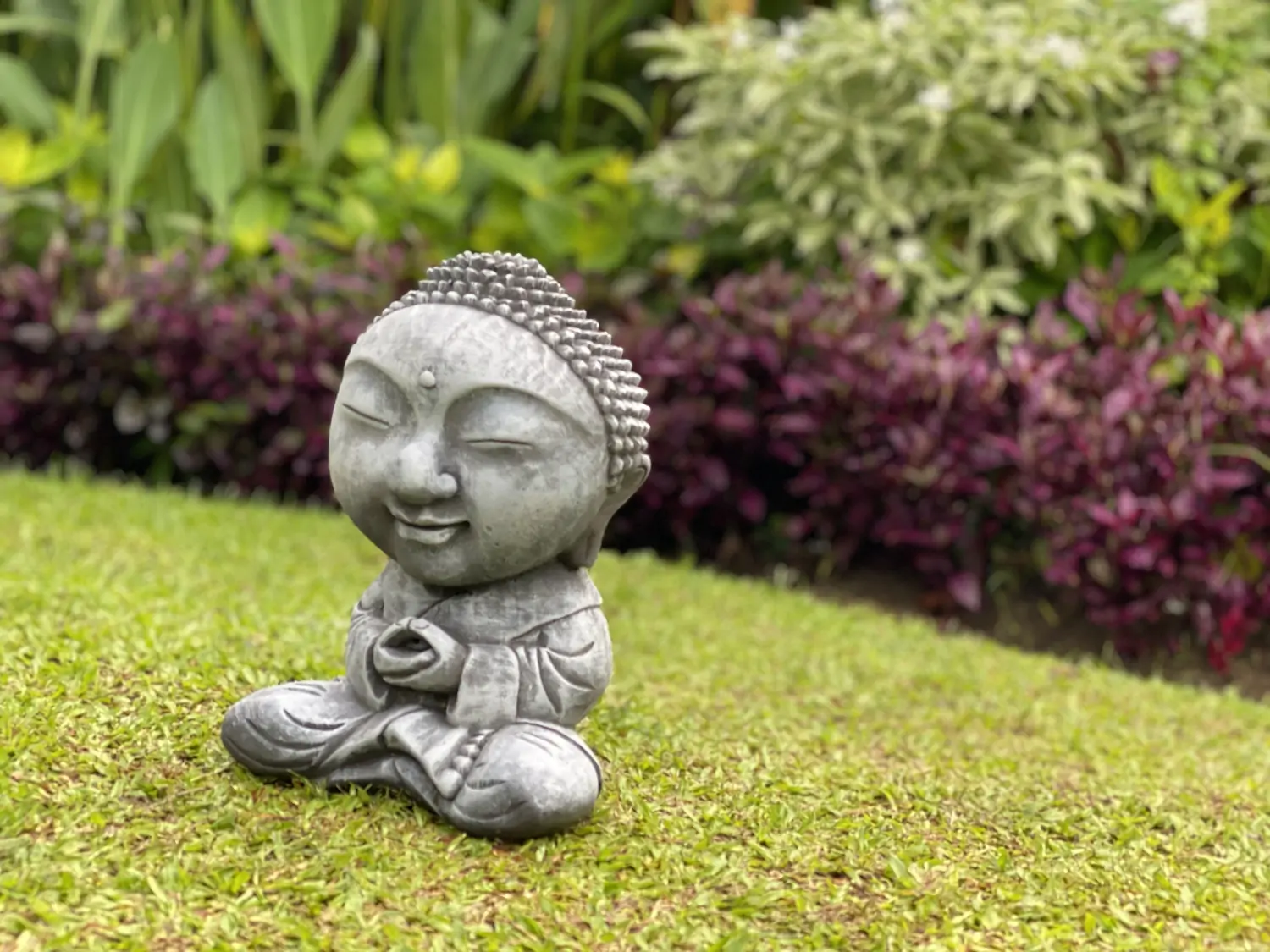  Product image 2 of the product “Nima - Sitting monk with big head, 20 cm H | cast stone ”
